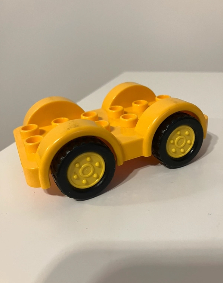 Lego® Duplo® podvozek k autu sv. oranžový, žlutá kolečka